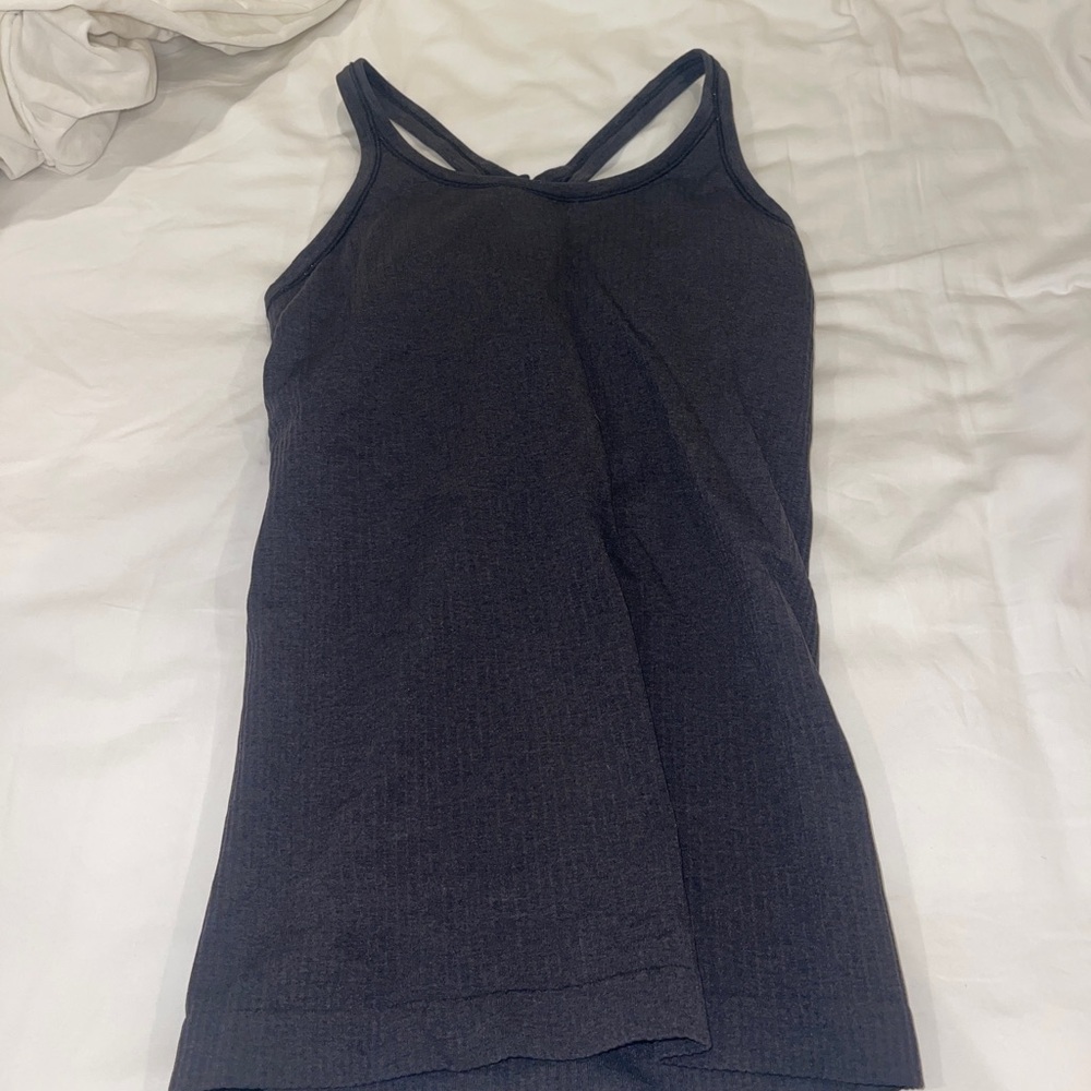 Lululemon ebb to street black tank top size 4